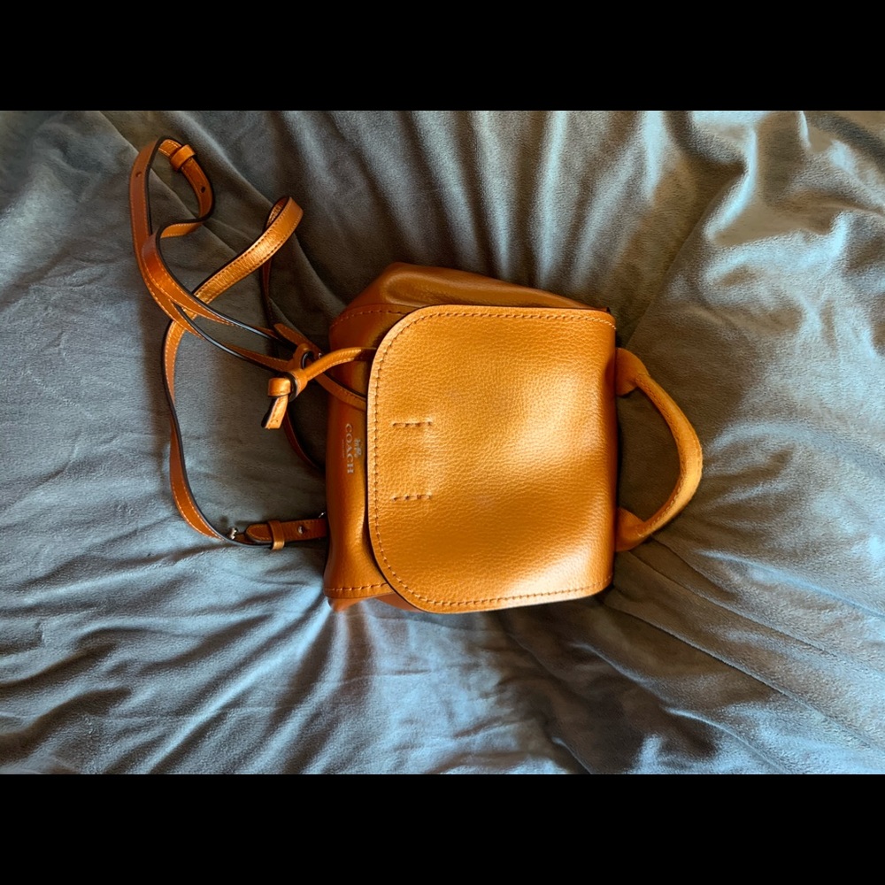 Coach metallic orange/tangerine backpack